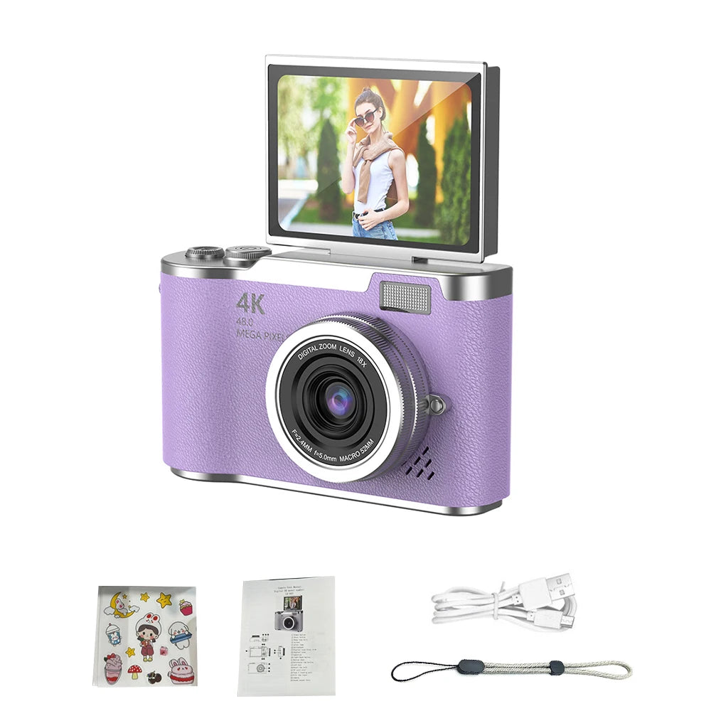 StudentCam mauve avec écran rabattable relevé, présenté avec une planche d’autocollants, un manuel, un câble USB et une dragonne.