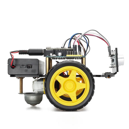 Robot Arduino ArduRover™ assemblé, vu de profil avec sa roue jaune, son câblage et son capteur avant.