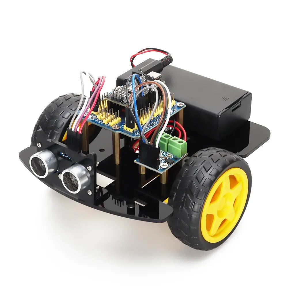 ArduRover™ assemblé, vu de trois quarts avec ses deux roues jaunes, sa carte câblée et son capteur à ultrason.