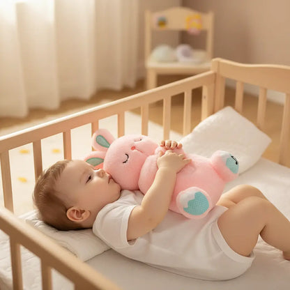 Peluche lapin rose ventre lumineux respirant allumé aide endormissement bébé nuit - Petit Curio