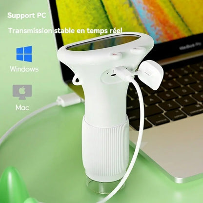 Microscope enfant numérique MicroPixel blanc relié par câble USB à un ordinateur portable.
