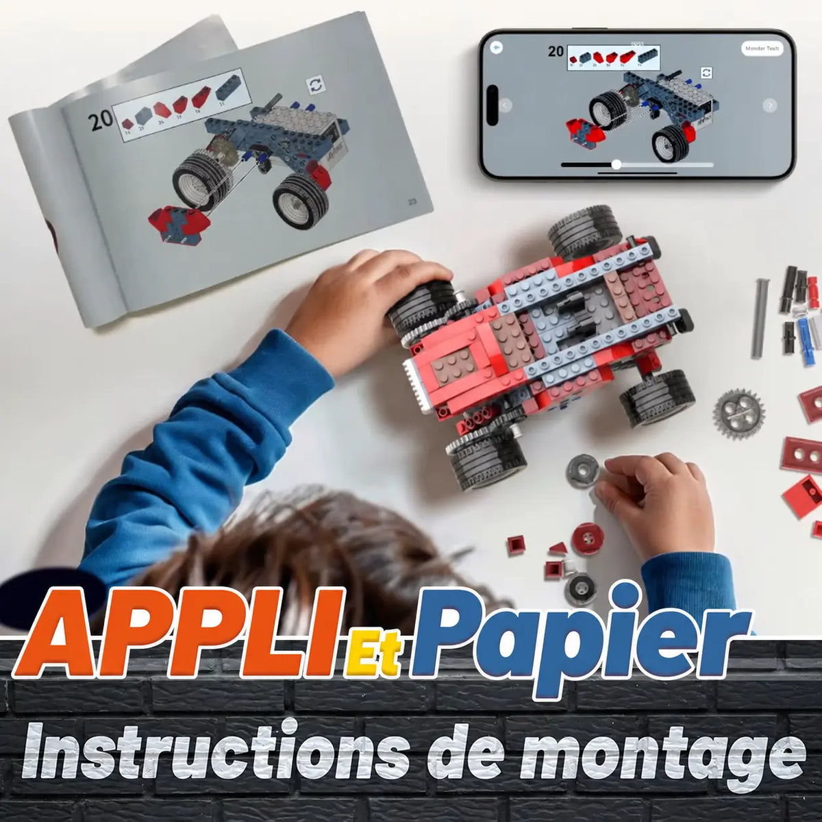 Enfant assemblant un véhicule Robot-Illico™ avec une notice papier et des instructions de montage sur téléphone